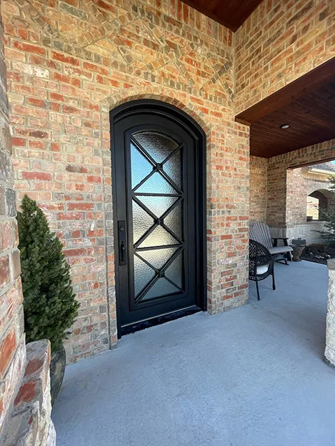 Custom iron door with transom